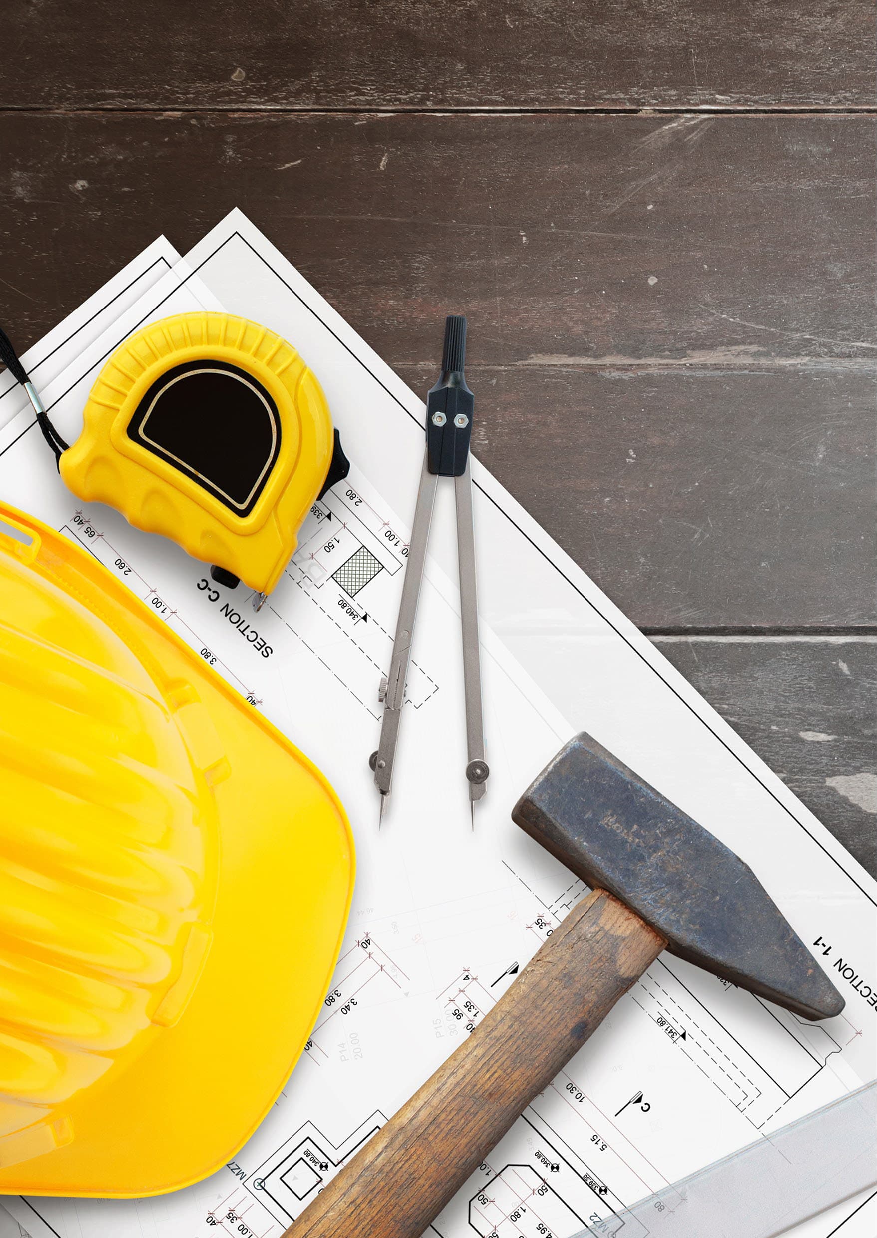 Construction tools on architectural blueprints