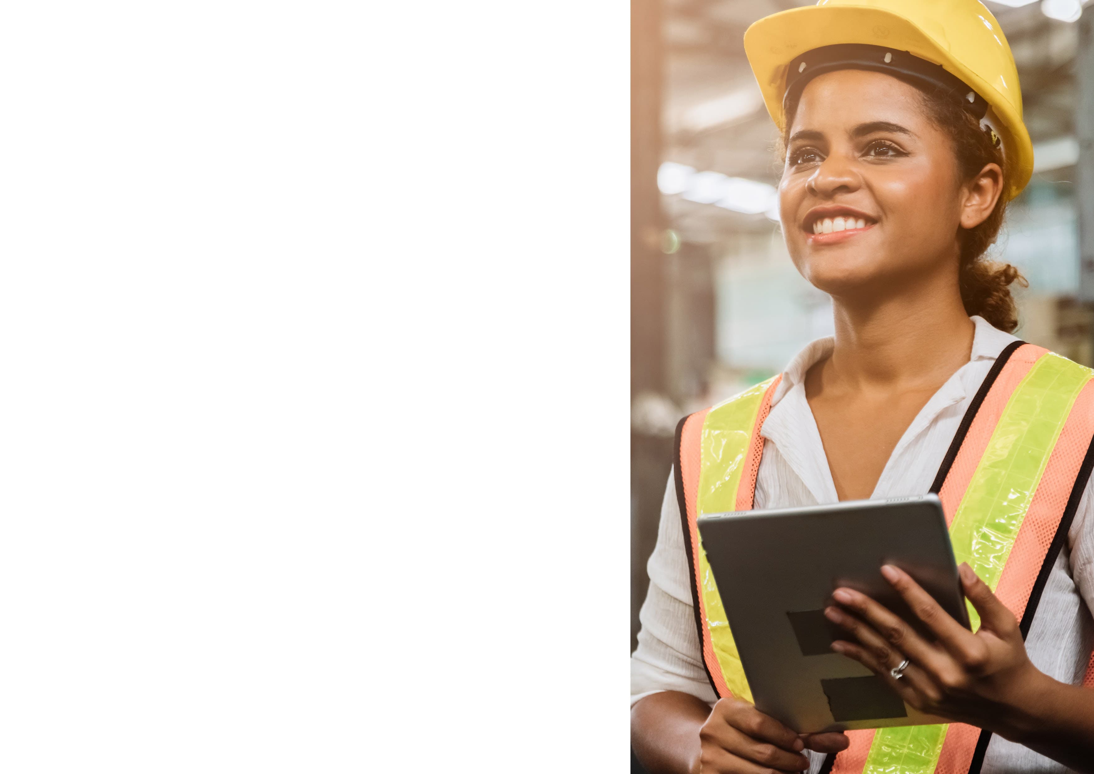 Construction professional with tablet on site