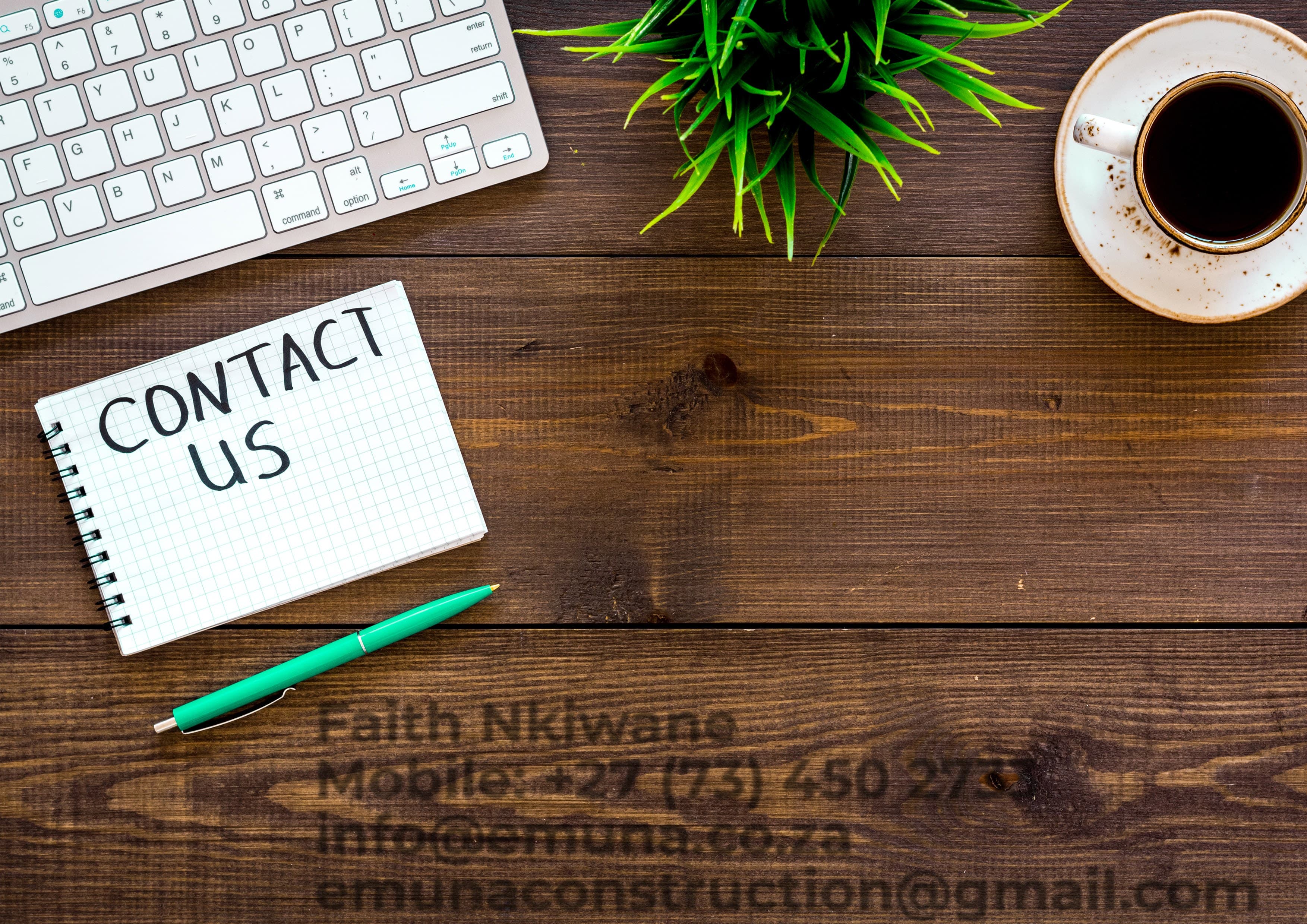 Office desk with notebook and coffee